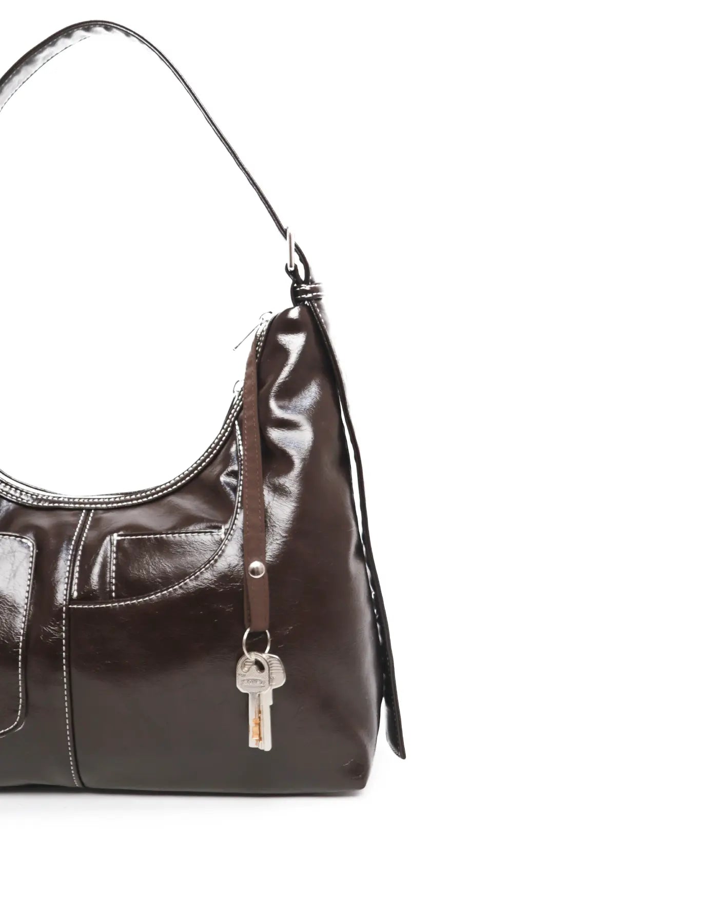 SIGNATURE POCKET LEATHER HOBO BAG IN ESPRESSO TSL Singapore