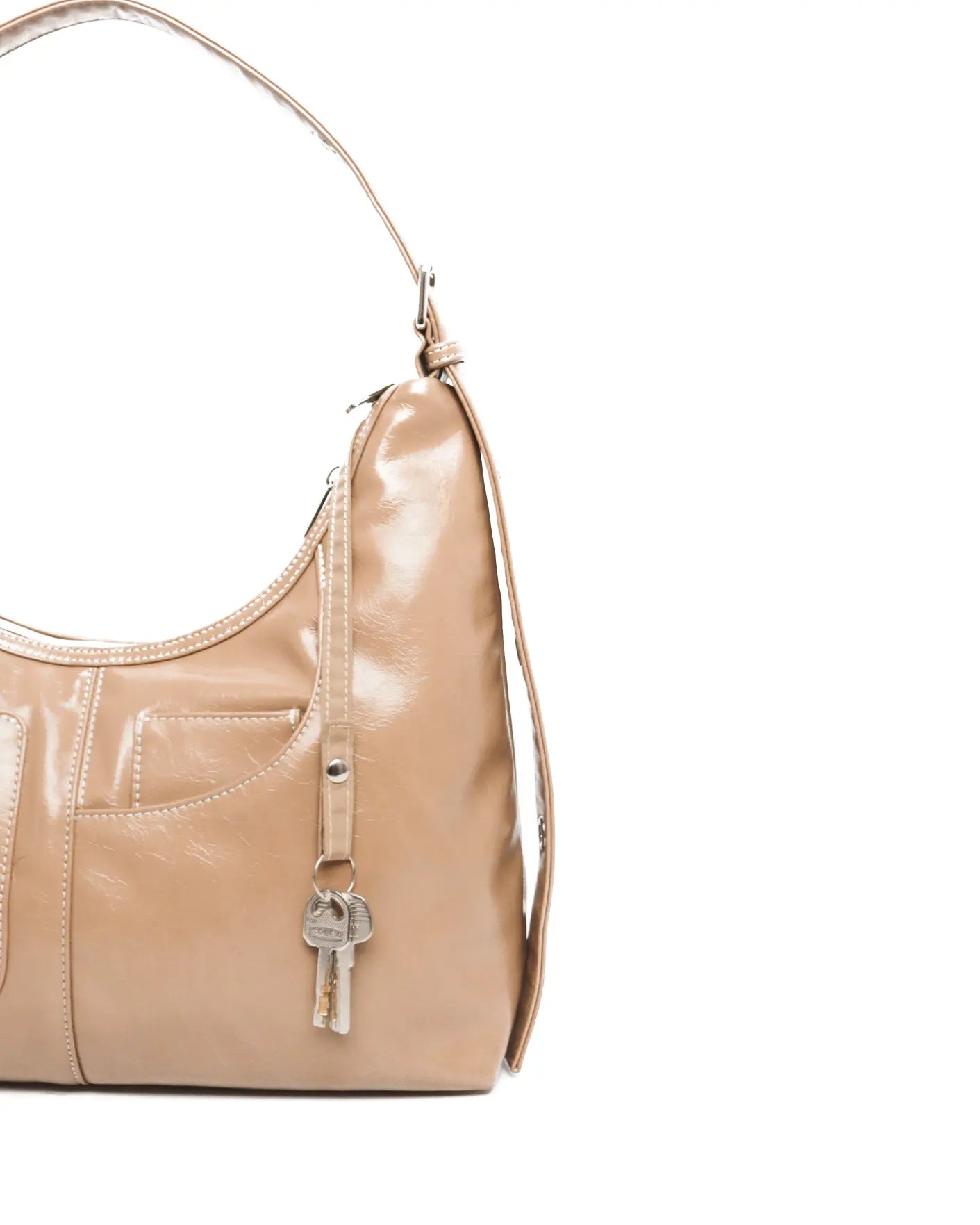 SIGNATURE POCKET LEATHER HOBO BAG IN MILK TEA TSL Singapore