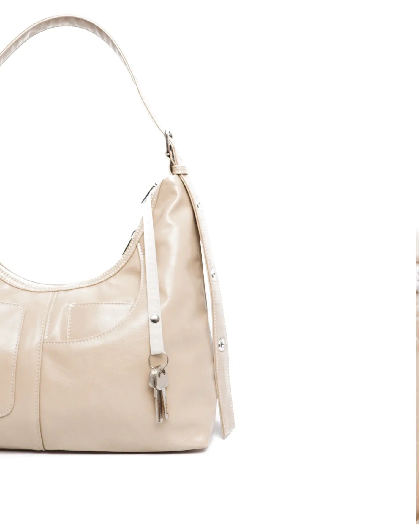 SIGNATURE POCKET LEATHER HOBO BAG IN SAND TSL Singapore