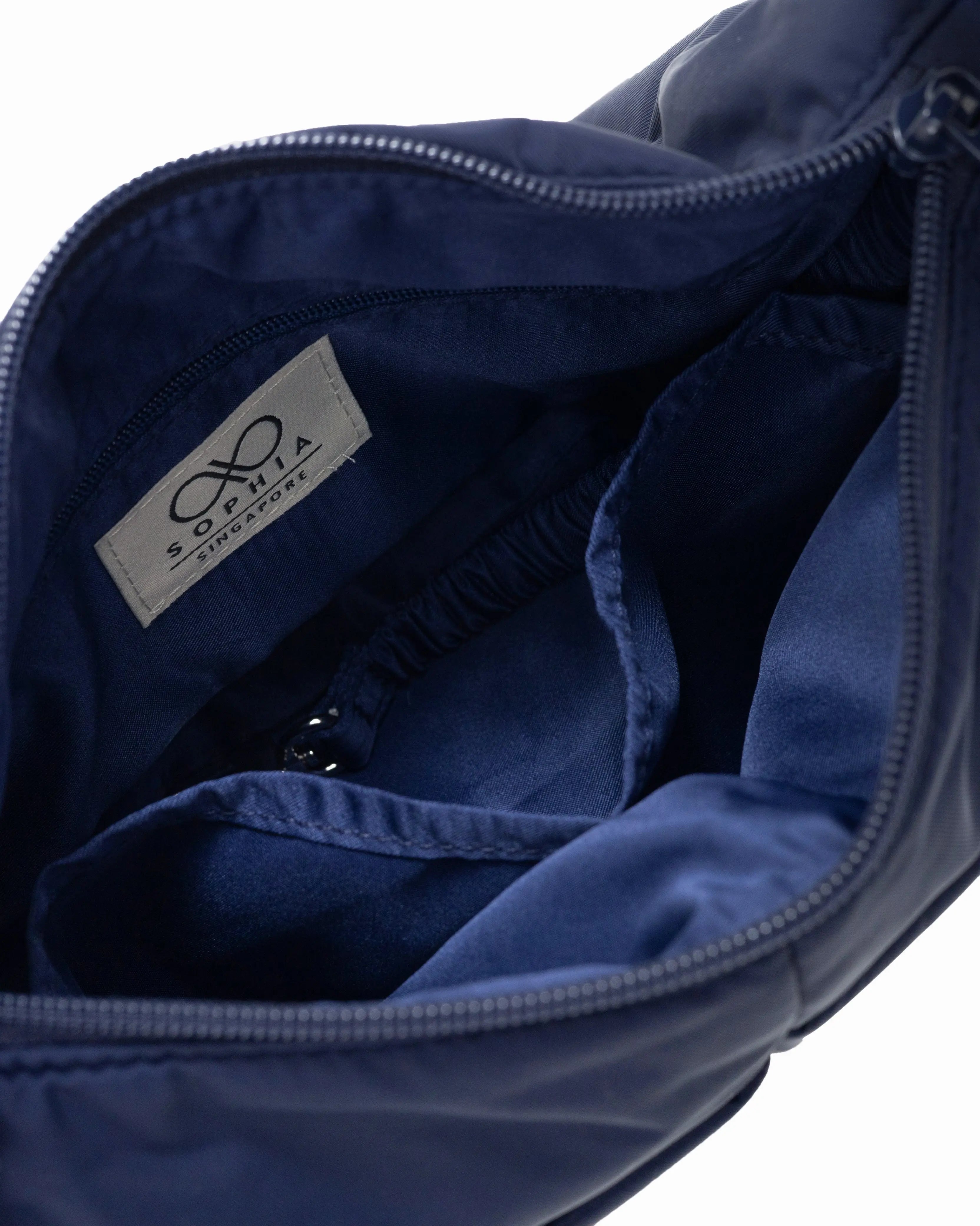 MINI SIGNATURE POCKET CROSSBODY BAG IN POSH MIDNIGHT