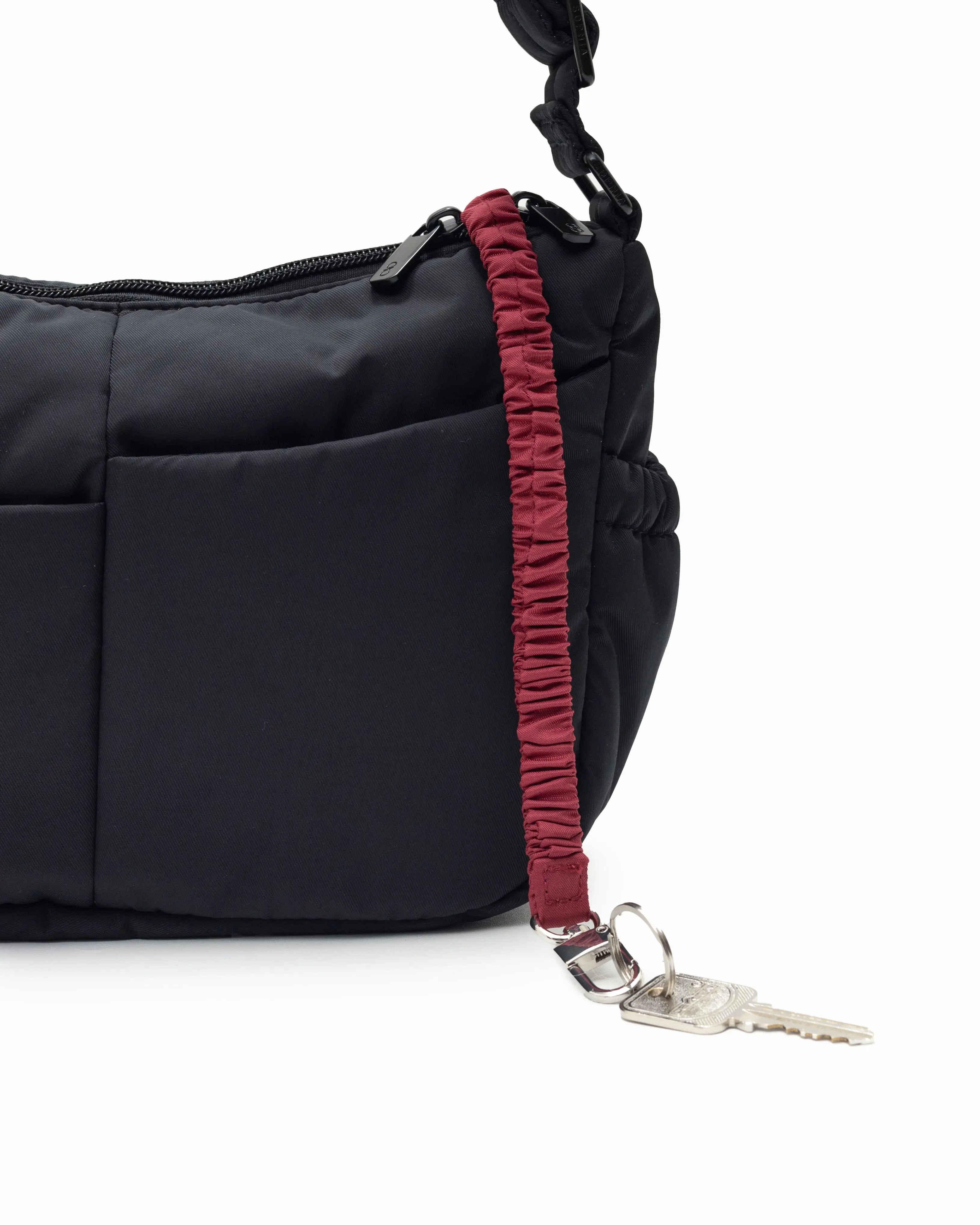MINI SIGNATURE POCKET CROSSBODY BAG IN POSH JET BLACK
