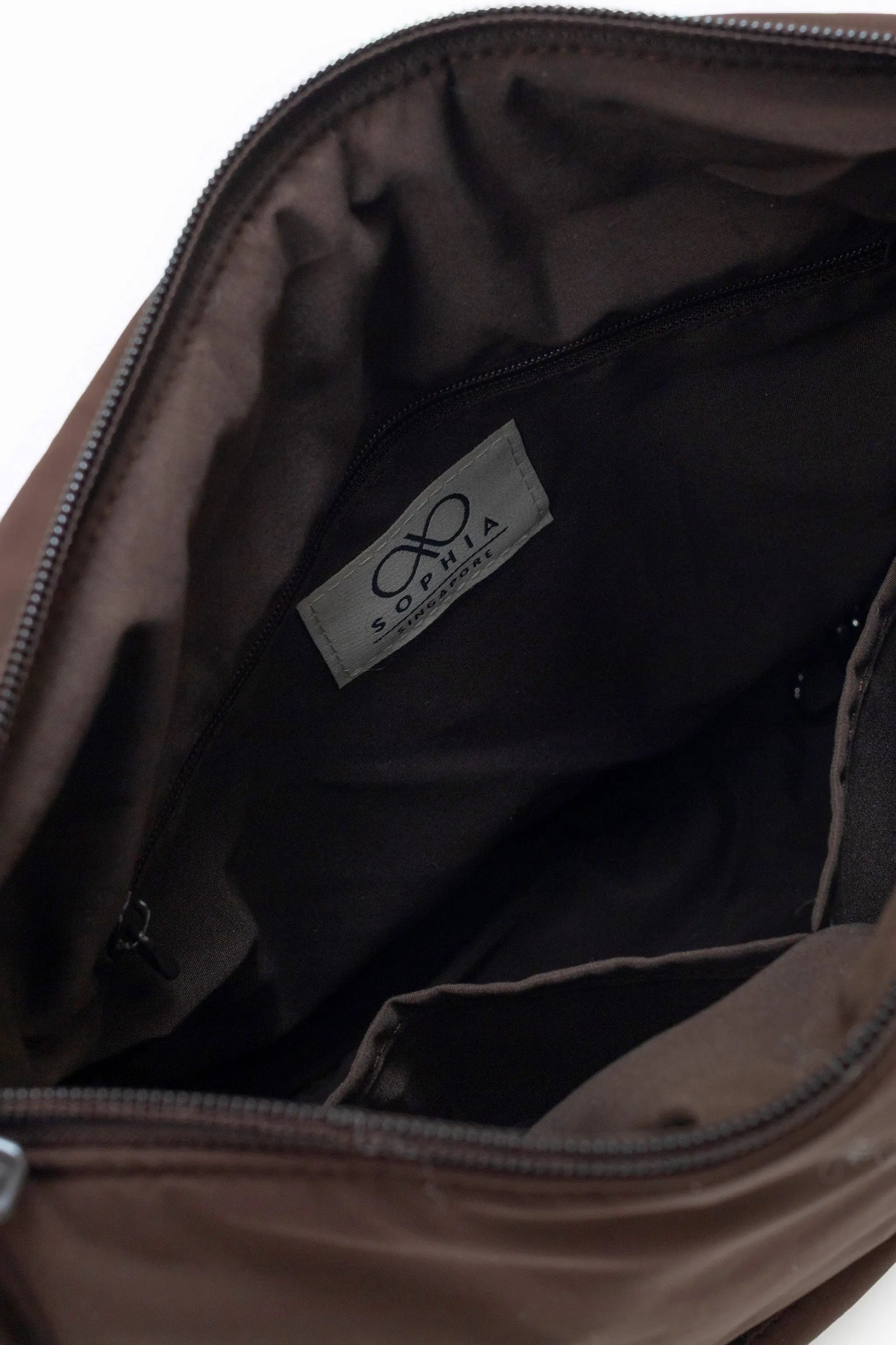 SIGNATURE POCKET CROSSBODY BAG 2.0 IN COSY CACAO