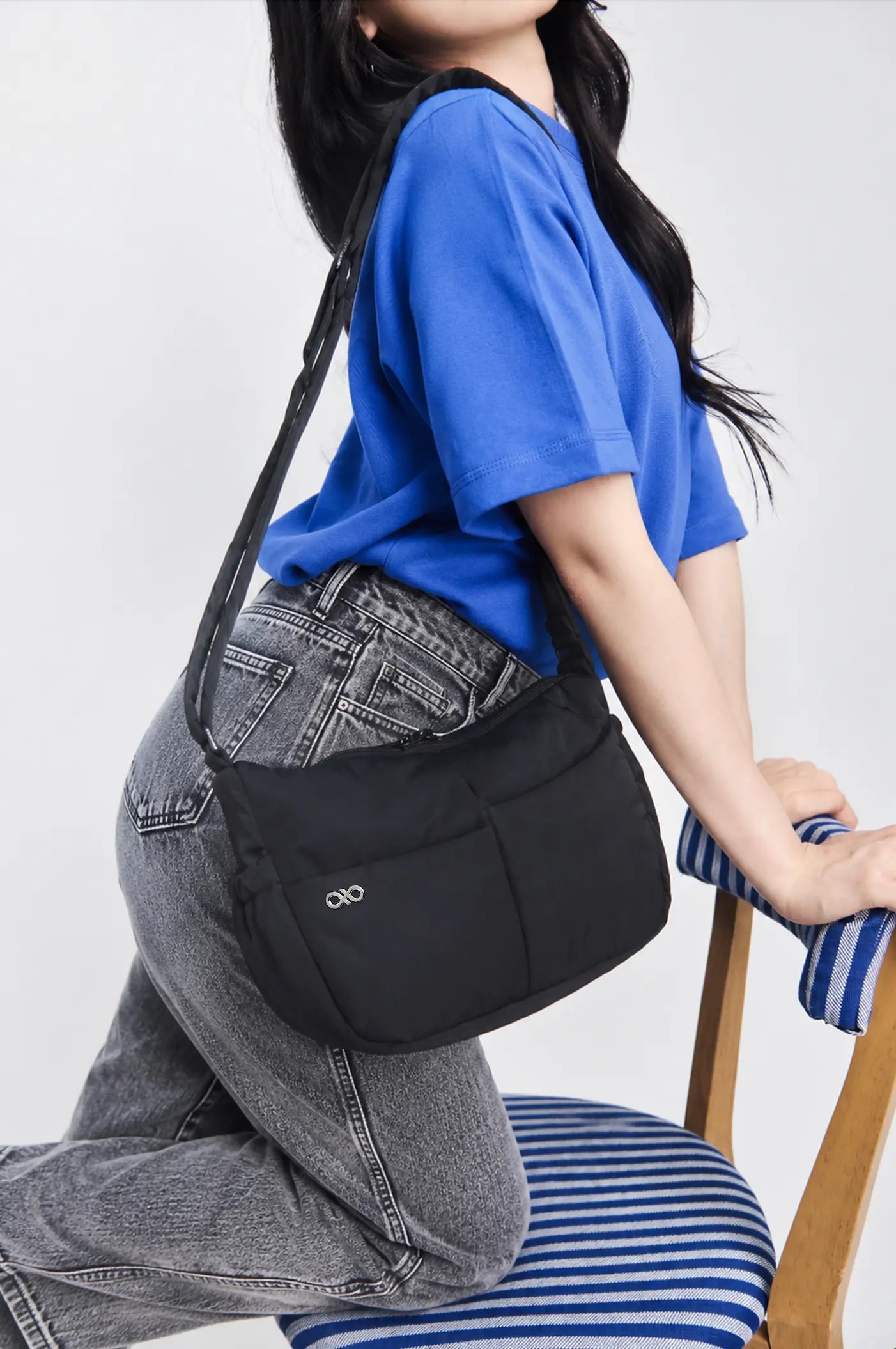 MINI SIGNATURE POCKET CROSSBODY BAG IN POSH JET BLACK