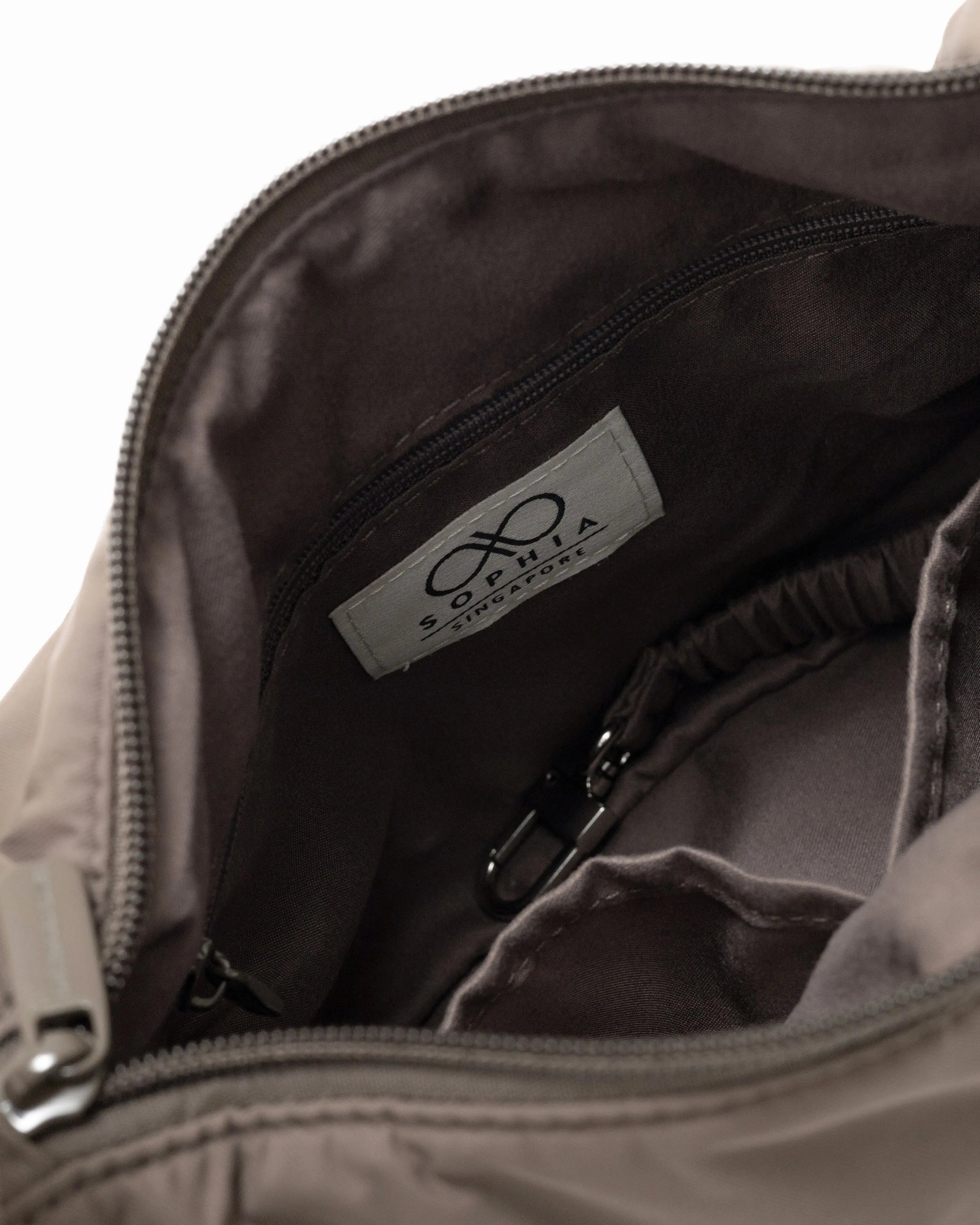 MINI SIGNATURE POCKET CROSSBODY BAG IN POSH TAUPE 