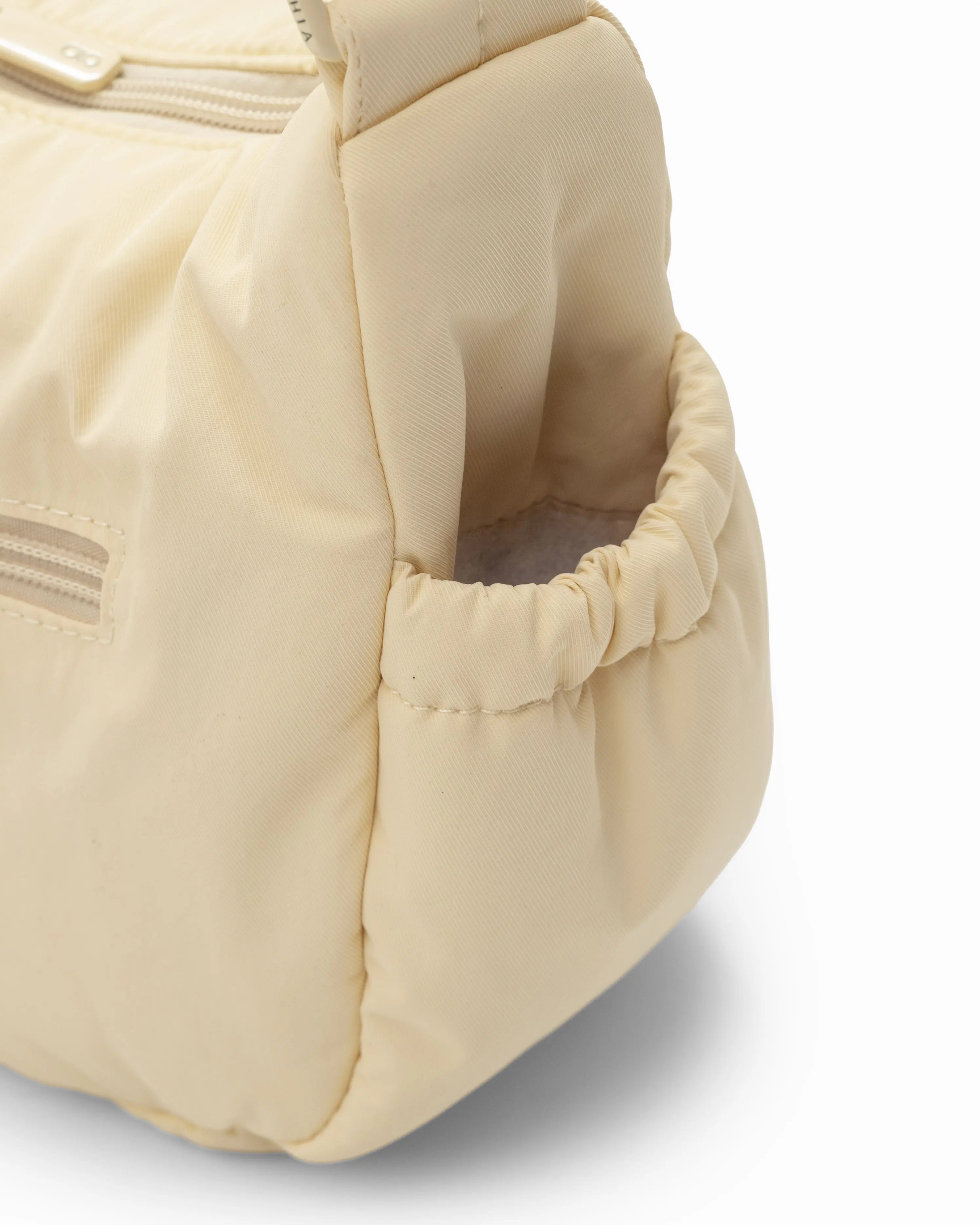 MINI SIGNATURE POCKET CROSSBODY BAG IN POSH MELLOW 