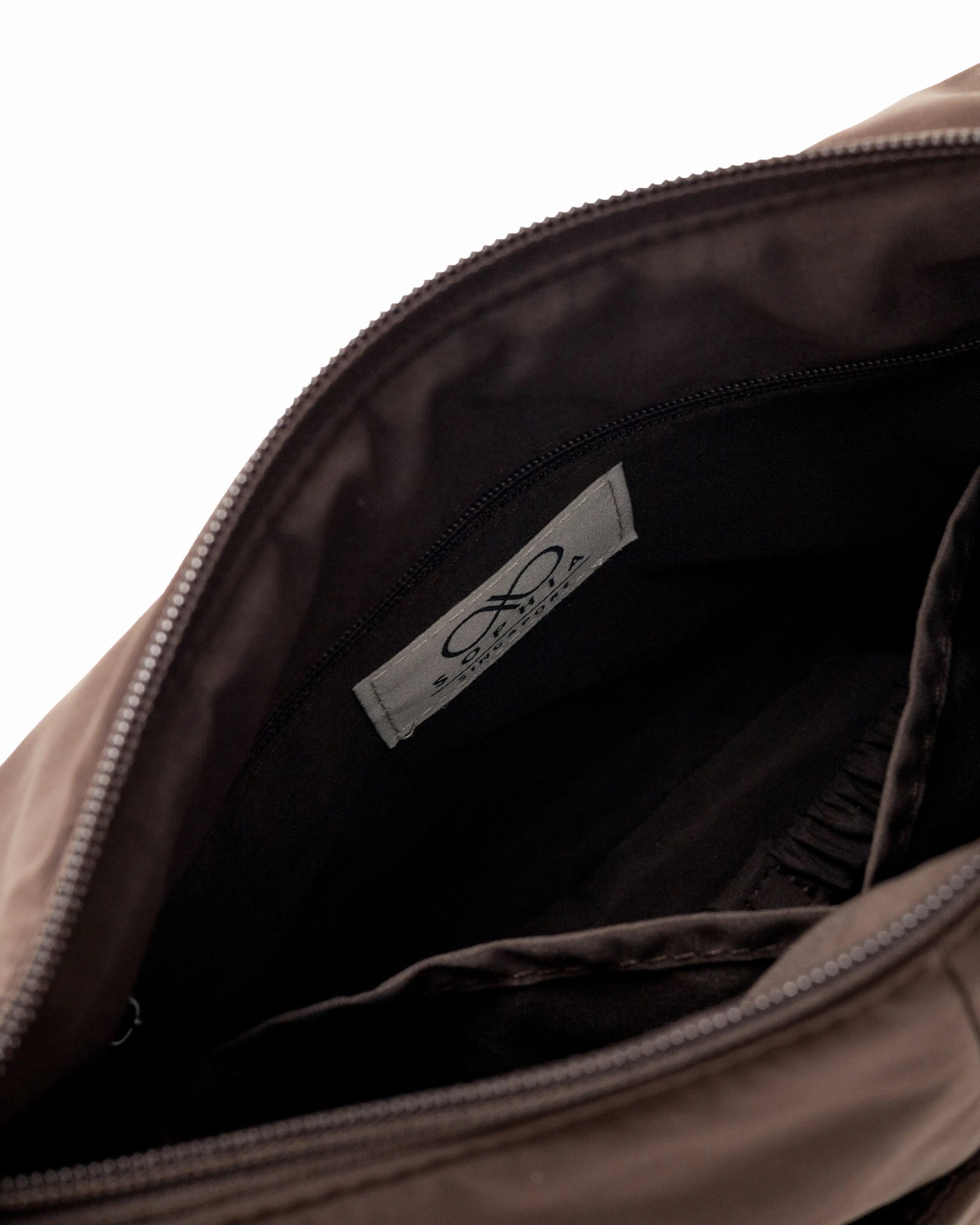 MINI SIGNATURE POCKET CROSSBODY BAG IN COSY LUXE CACAO 