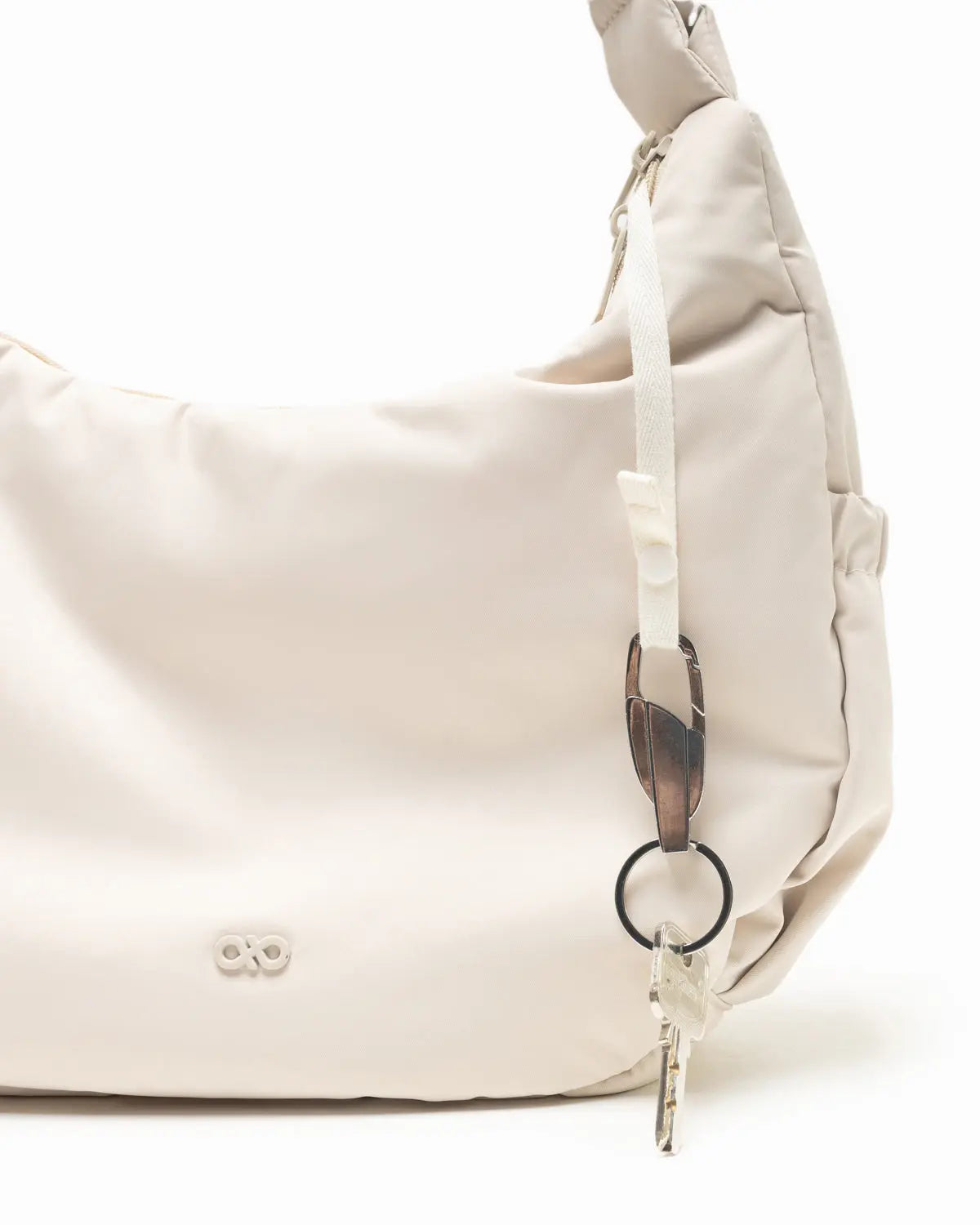 L COSY LUXE CRESCENT BAG IN OAT The Sophia Label