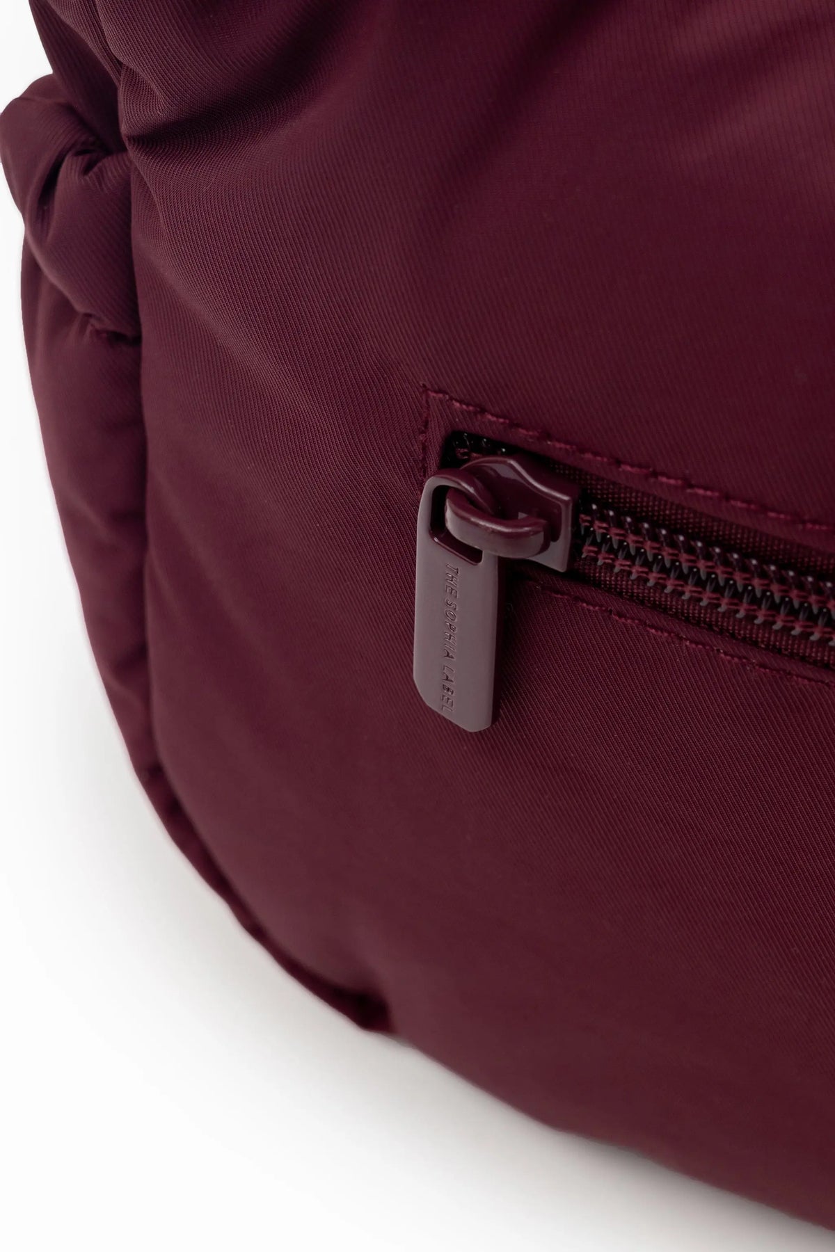 MINI SIGNATURE POCKET CROSSBODY BAG IN POSH WINE 