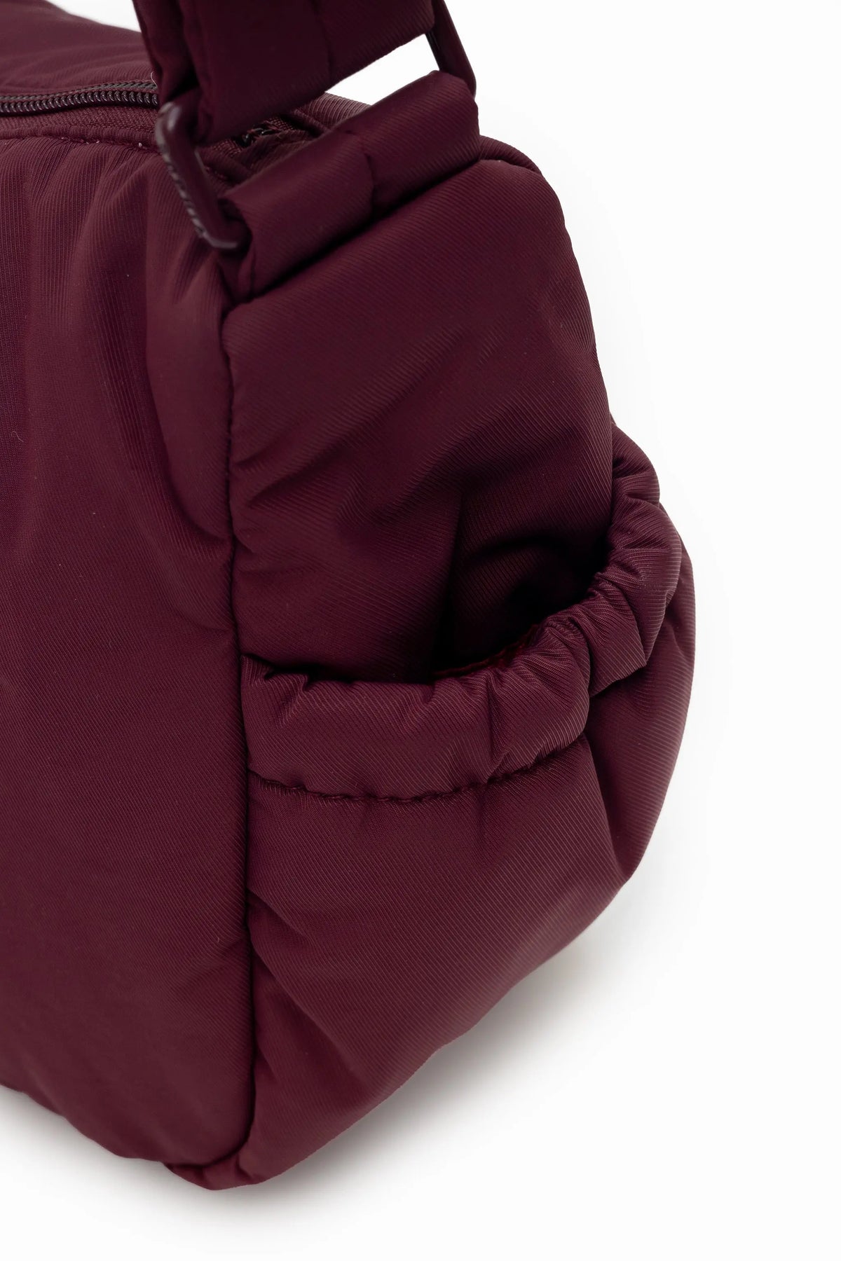 MINI SIGNATURE POCKET CROSSBODY BAG IN POSH WINE 