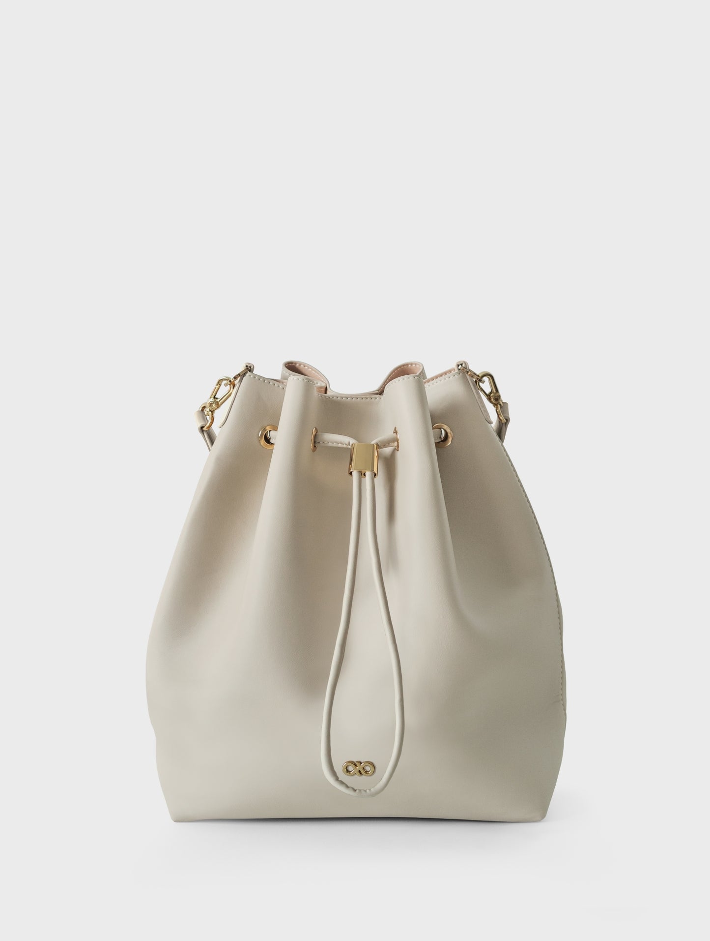 REINA MAGIC BUCKET BAG IN ALMOND